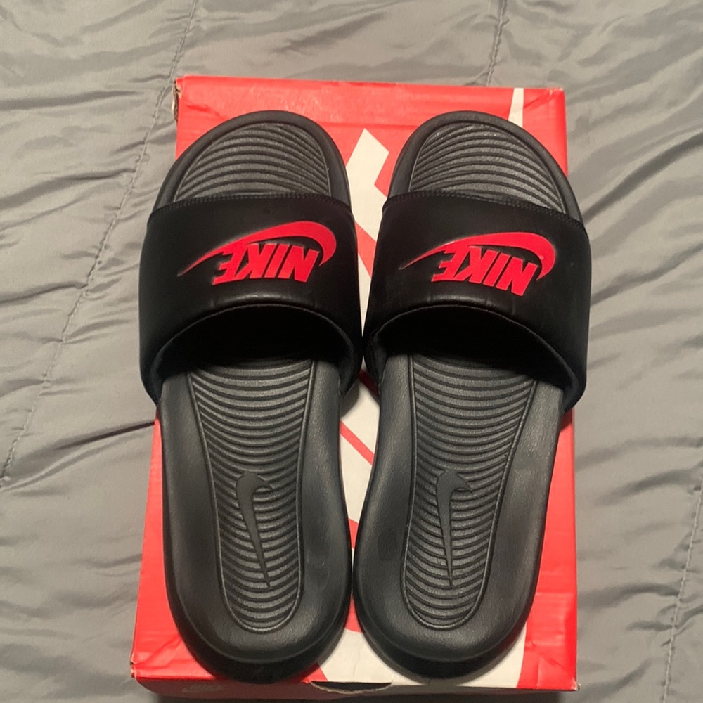 Red and Black Nike slides